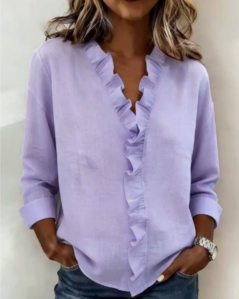 COLETTE-CAMICETTA CON VOLANT, SCOLLO A V E MANICHE LUNGHE